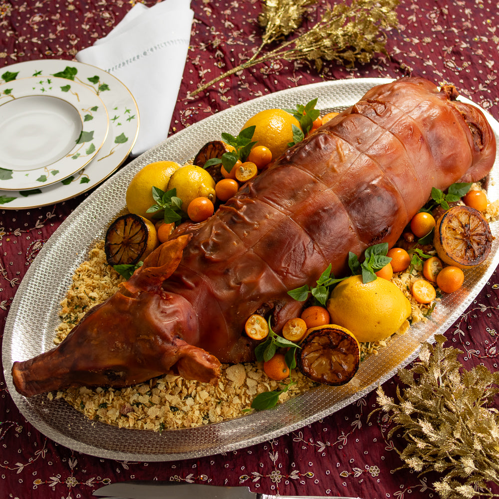 Leitão Recheado com Linguiça Portuguesa- Folha de Mostarda- Farofa de Araçatuba e Limão Siciliano