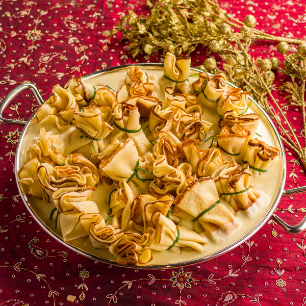 Trouxinha de Queijo Brie com Molho Cremoso de Parmesão