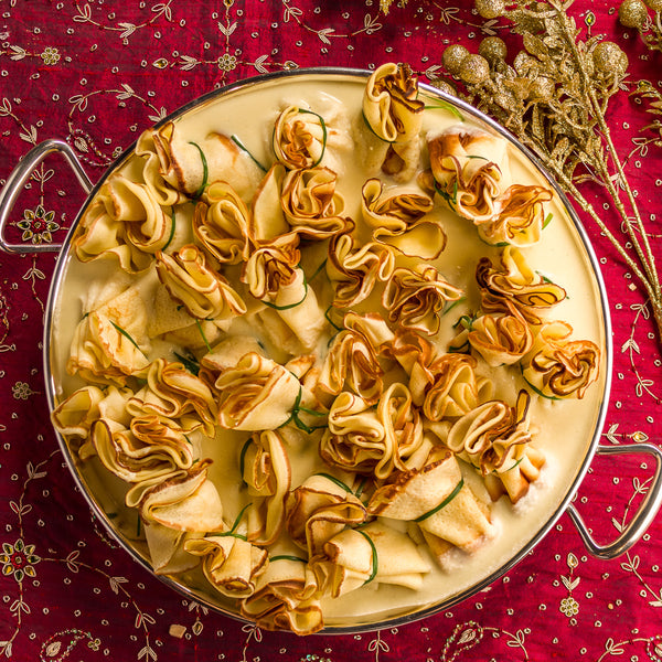 Trouxinha de Queijo Brie com Molho Cremoso de Parmesão