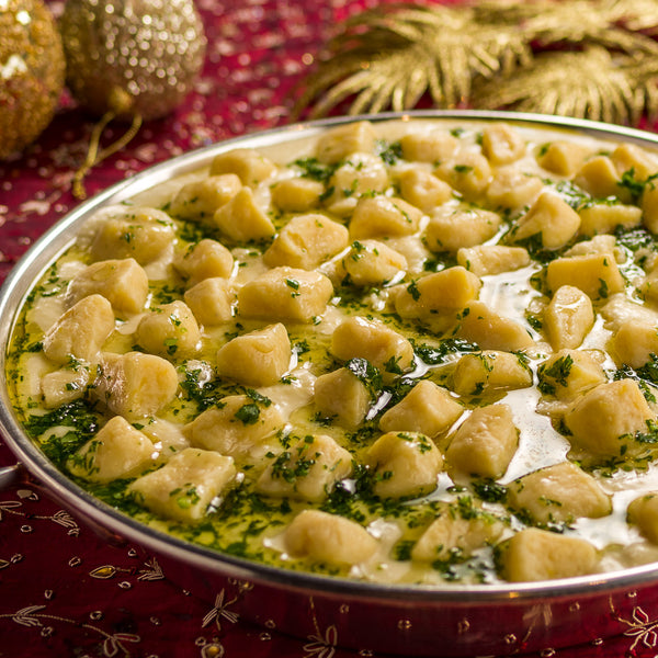 Nhoque de Mandioquinha com Molho Fresco de Parmesão e Salsa Trufada
